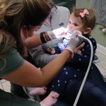 Child receiving dental care