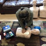 Our dentist practicing CPR